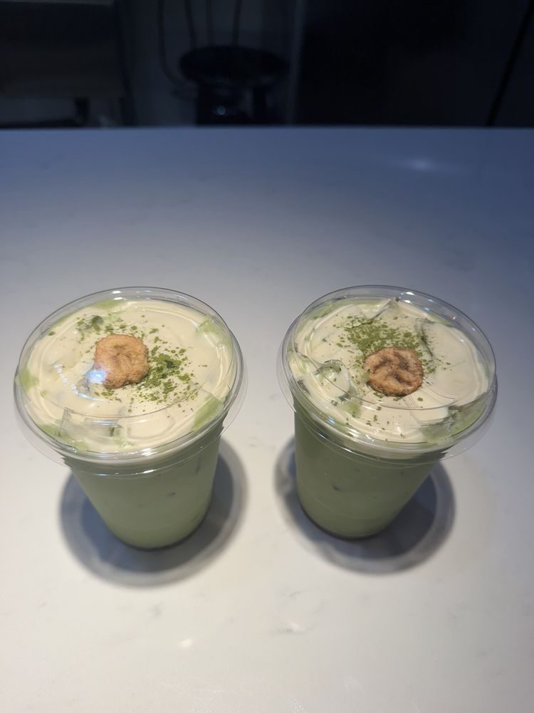 Two iced banana matcha lattes